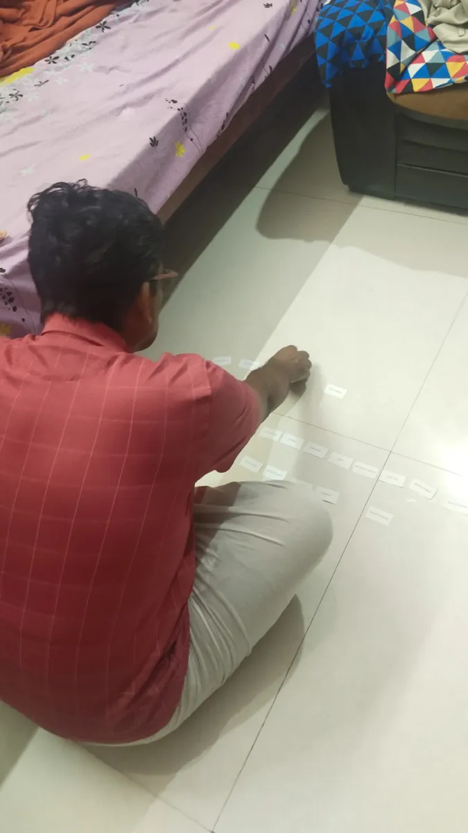 Card sorting with a 49-year-old part-time farmer, cards laid out on the floor